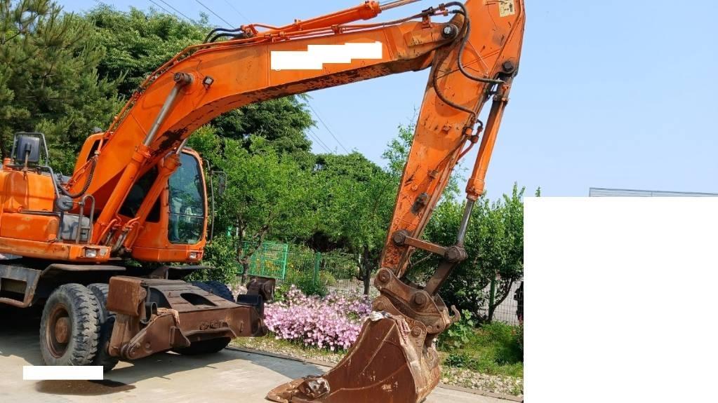 Doosan DX 210 W ホイール式油圧ショベル（パワーショベル・ユンボ・バックホー）