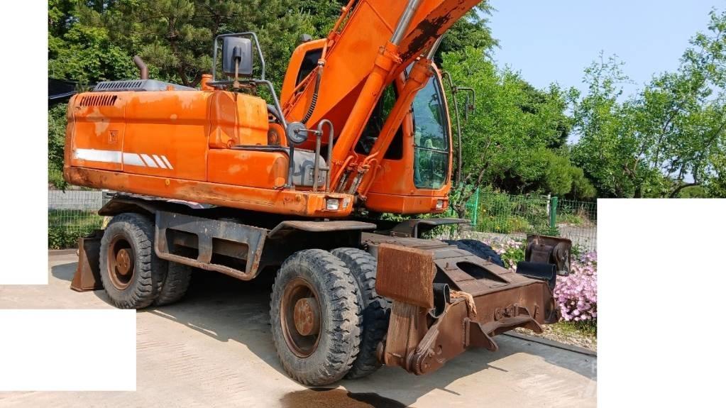 Doosan DX 210 W ホイール式油圧ショベル（パワーショベル・ユンボ・バックホー）