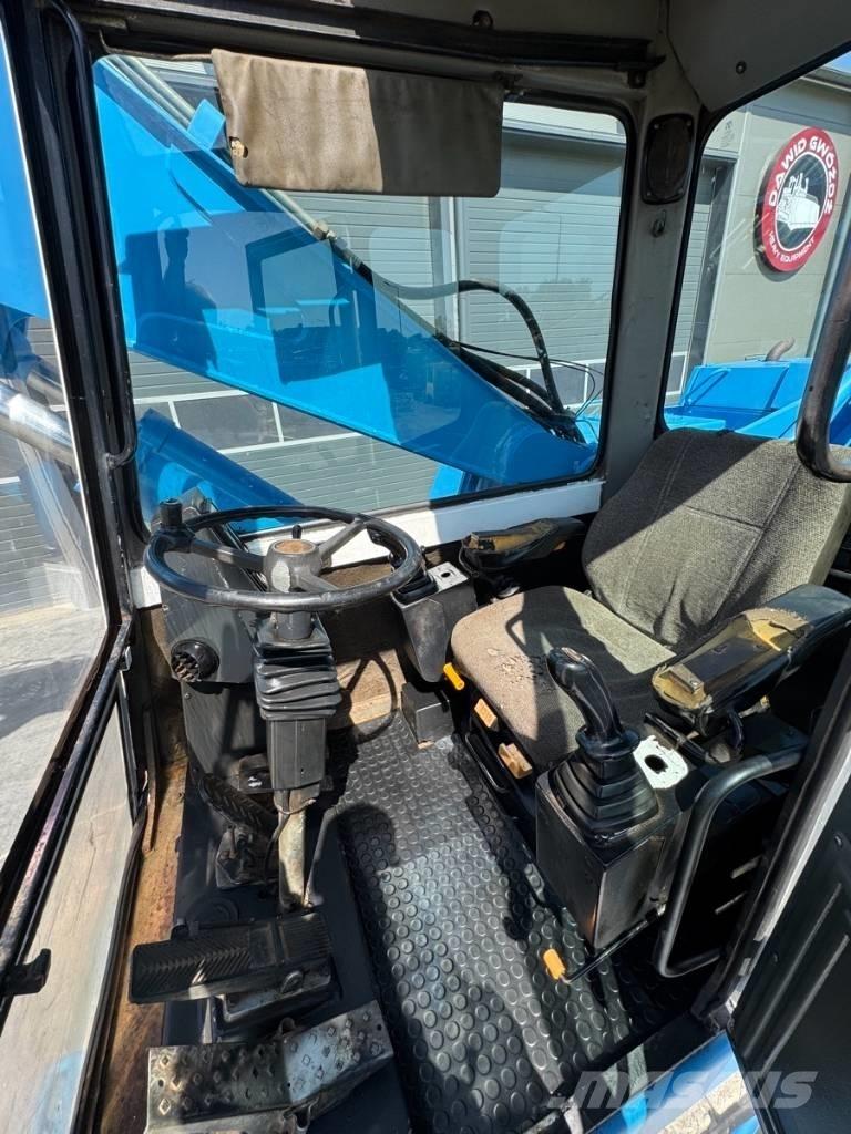 Fuchs MHL 331 廃棄物／工業産廃処理機