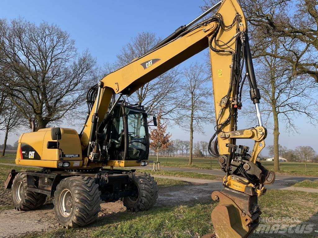 CAT M 313 D ホイール式油圧ショベル（パワーショベル・ユンボ・バックホー）