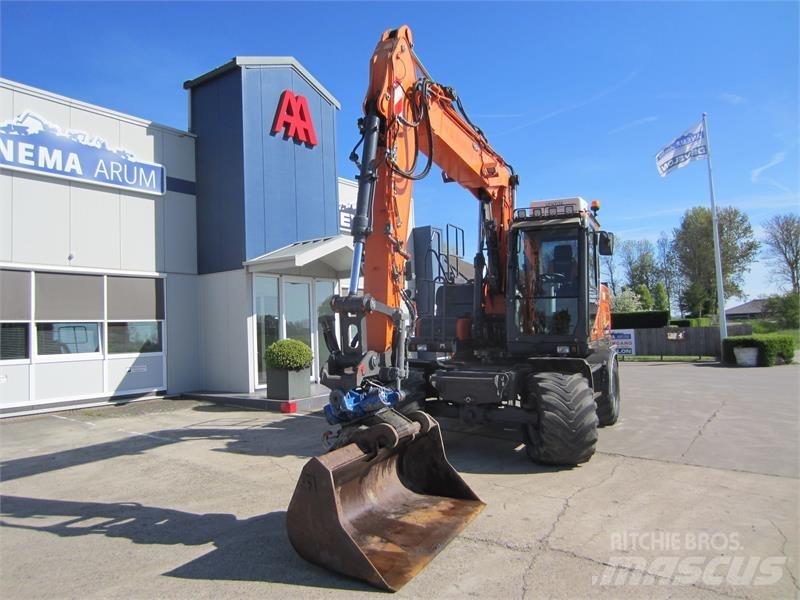 Doosan DX140W-3 ホイール式油圧ショベル（パワーショベル・ユンボ・バックホー）