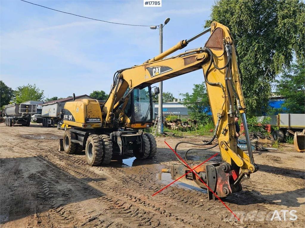 CAT M313 C ホイール式油圧ショベル（パワーショベル・ユンボ・バックホー）