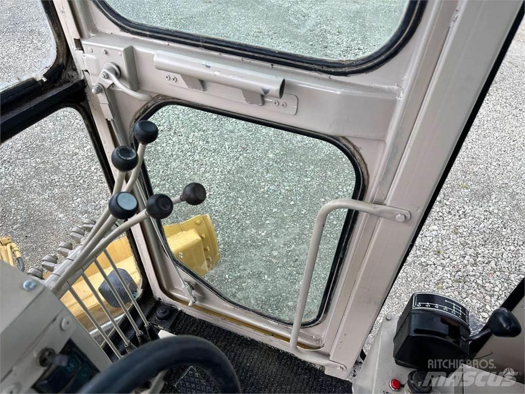 CAT 140 H モーターグレーダー