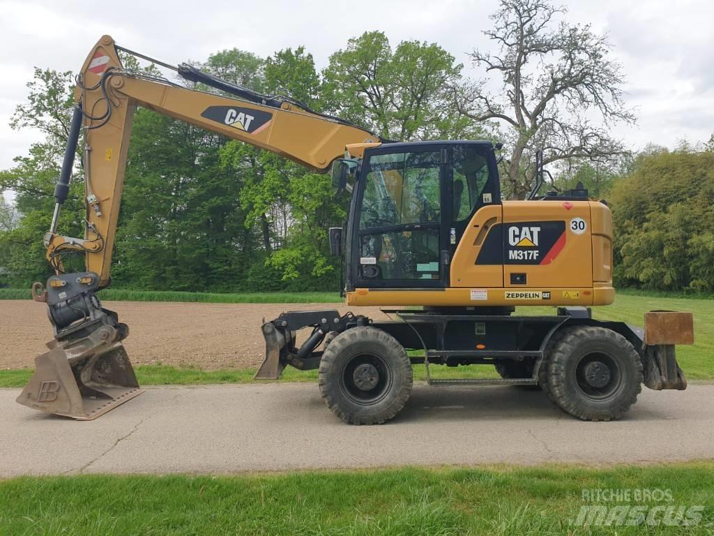 CAT M 317 F ホイール式油圧ショベル（パワーショベル・ユンボ・バックホー）