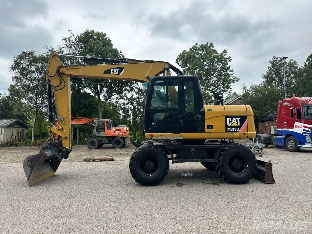 CAT M 313 D ホイール式油圧ショベル（パワーショベル・ユンボ・バックホー）