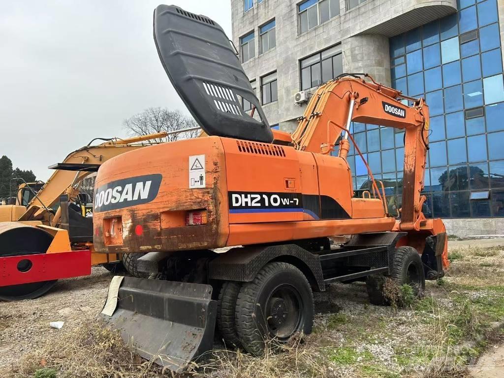 Doosan DH 210 W ホイール式油圧ショベル（パワーショベル・ユンボ・バックホー）