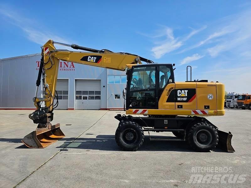 CAT M 318 F ホイール式油圧ショベル（パワーショベル・ユンボ・バックホー）