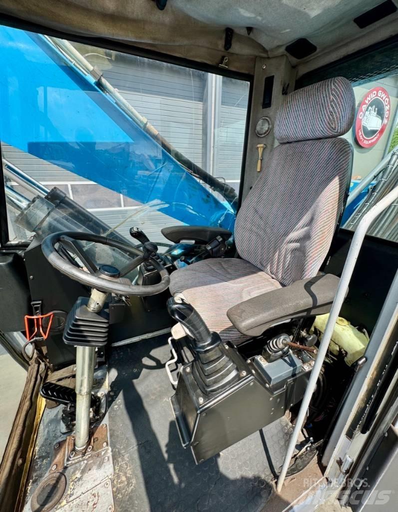 Fuchs MHL 331 廃棄物／工業産廃処理機