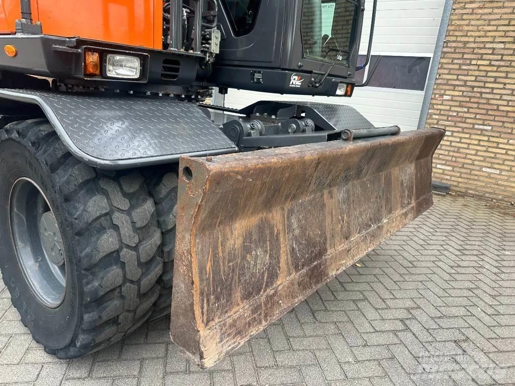 Doosan DX140W-5 ホイール式油圧ショベル（パワーショベル・ユンボ・バックホー）