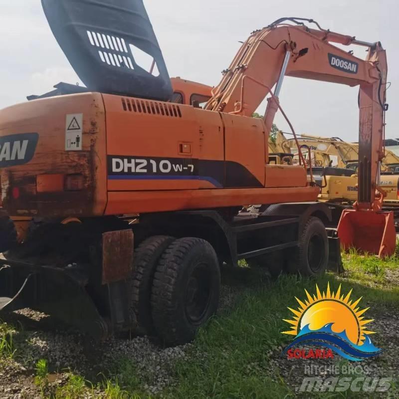 Doosan DH 210 W ホイール式油圧ショベル（パワーショベル・ユンボ・バックホー）