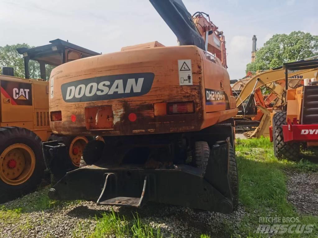 Doosan DH 210 W ホイール式油圧ショベル（パワーショベル・ユンボ・バックホー）