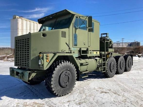 Oshkosh M1070 中古トラクターヘッド | トレーラーヘッド