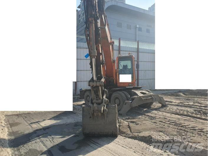 Doosan DX 210 WA ホイール式油圧ショベル（パワーショベル・ユンボ・バックホー）