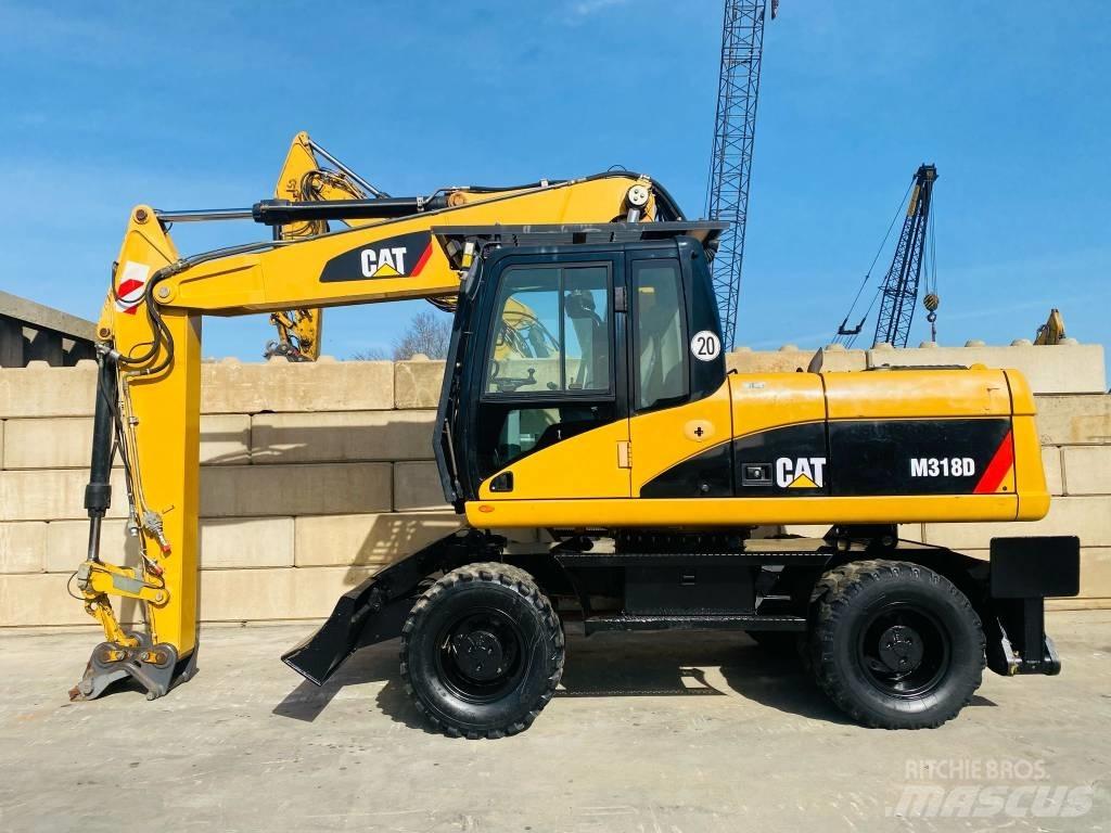 CAT M 318 D ホイール式油圧ショベル（パワーショベル・ユンボ・バックホー）