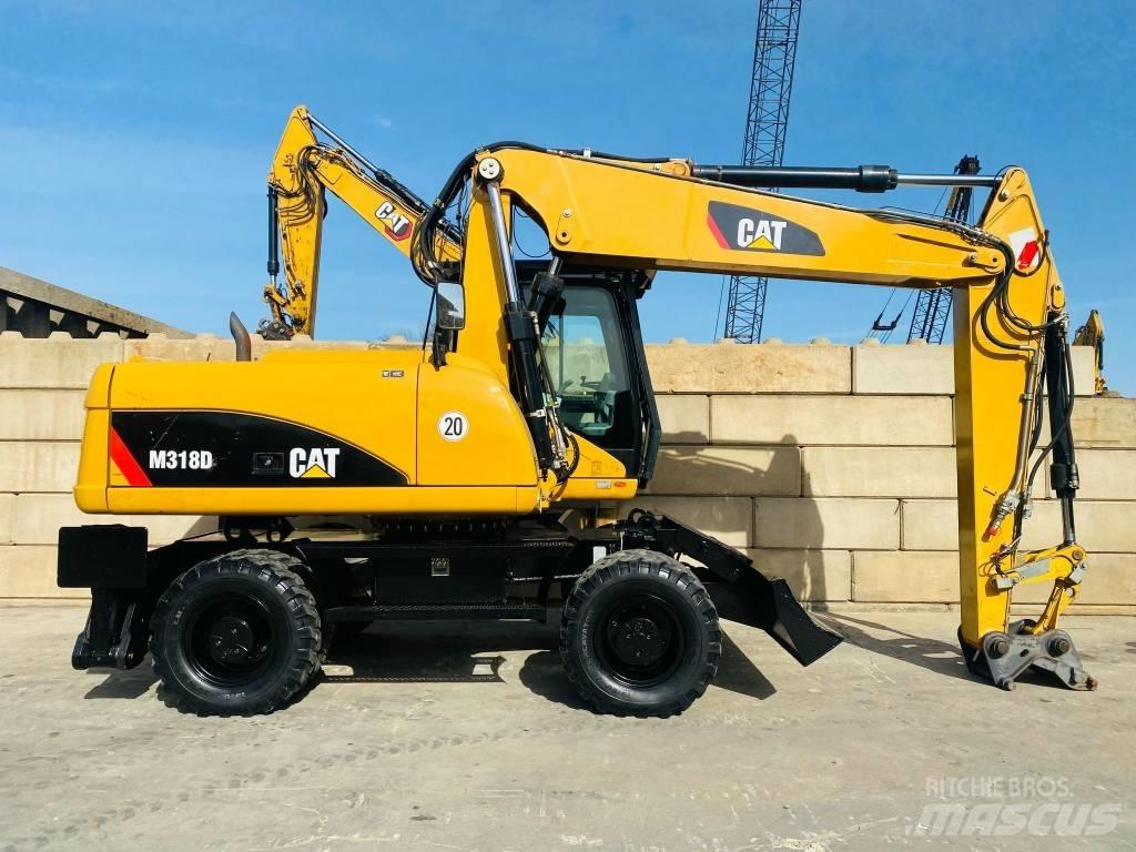 CAT M 318 D ホイール式油圧ショベル（パワーショベル・ユンボ・バックホー）