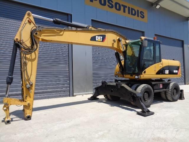 CAT M 318 D ホイール式油圧ショベル（パワーショベル・ユンボ・バックホー）