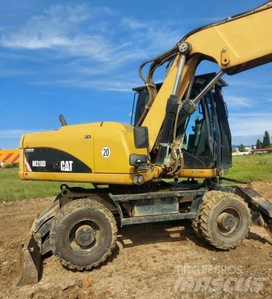 CAT M318 D ホイール式油圧ショベル（パワーショベル・ユンボ・バックホー）