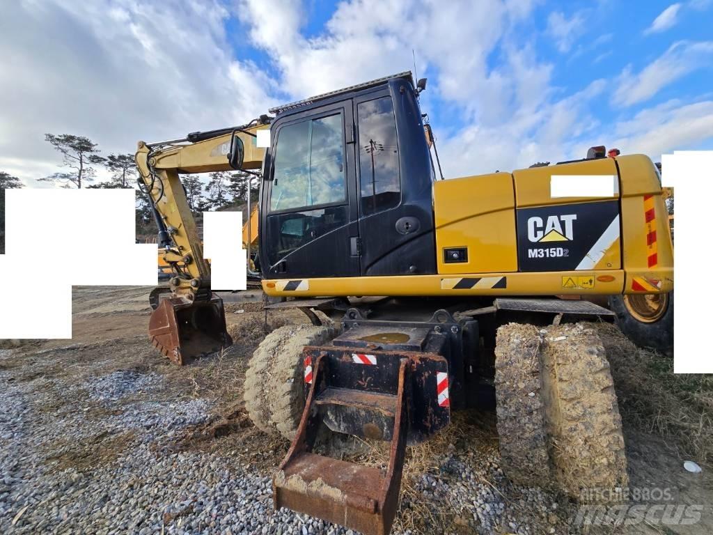 CAT M 315 D ホイール式油圧ショベル（パワーショベル・ユンボ・バックホー）
