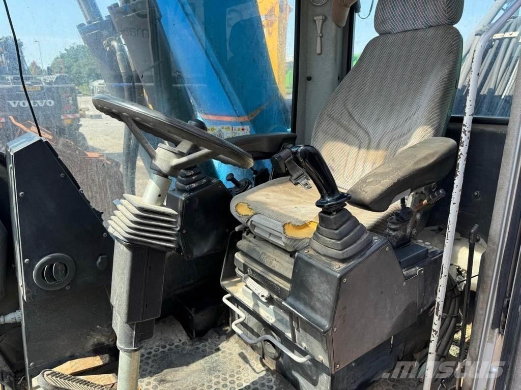 Fuchs MHL 320 廃棄物／工業産廃処理機