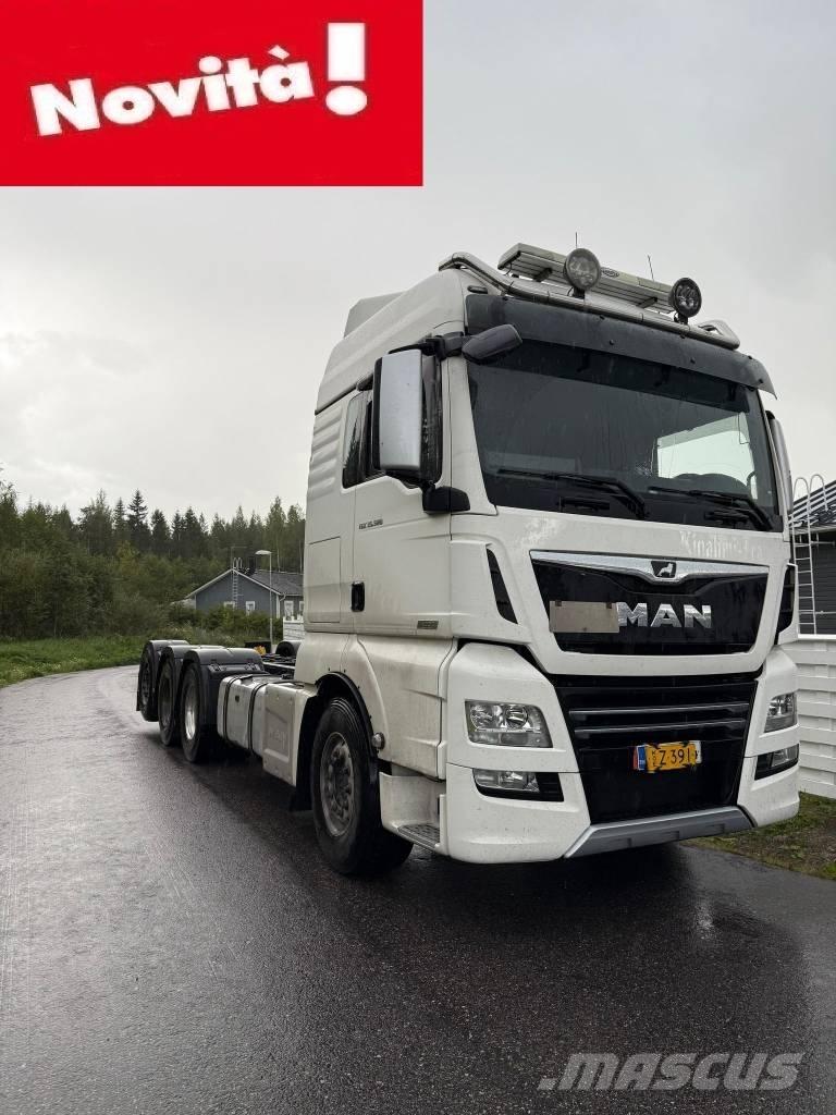 MAN TGX 32.580 平ボディー／ウインチトラック