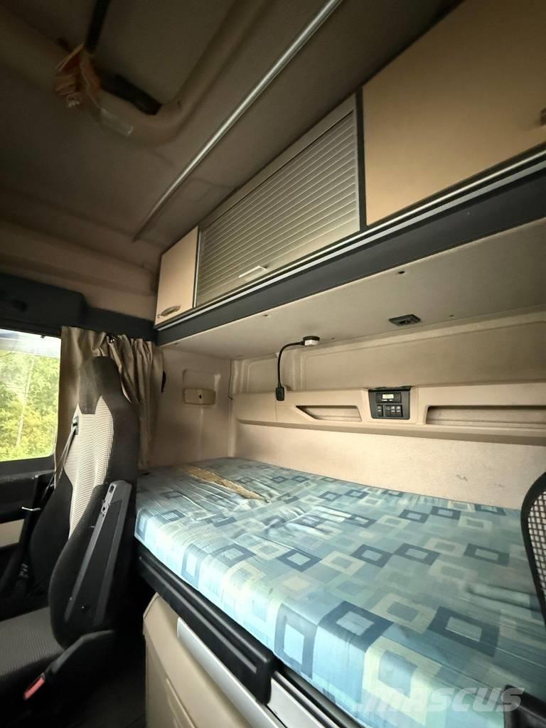 MAN TGX 32.580 平ボディー／ウインチトラック
