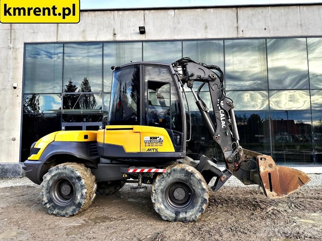 Mecalac 12 M TX バックホーローダー