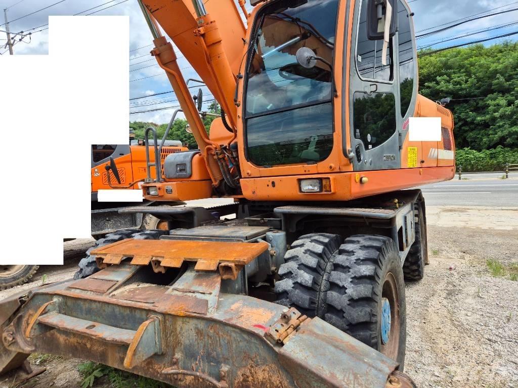 Doosan DX210WA ホイール式油圧ショベル（パワーショベル・ユンボ・バックホー）