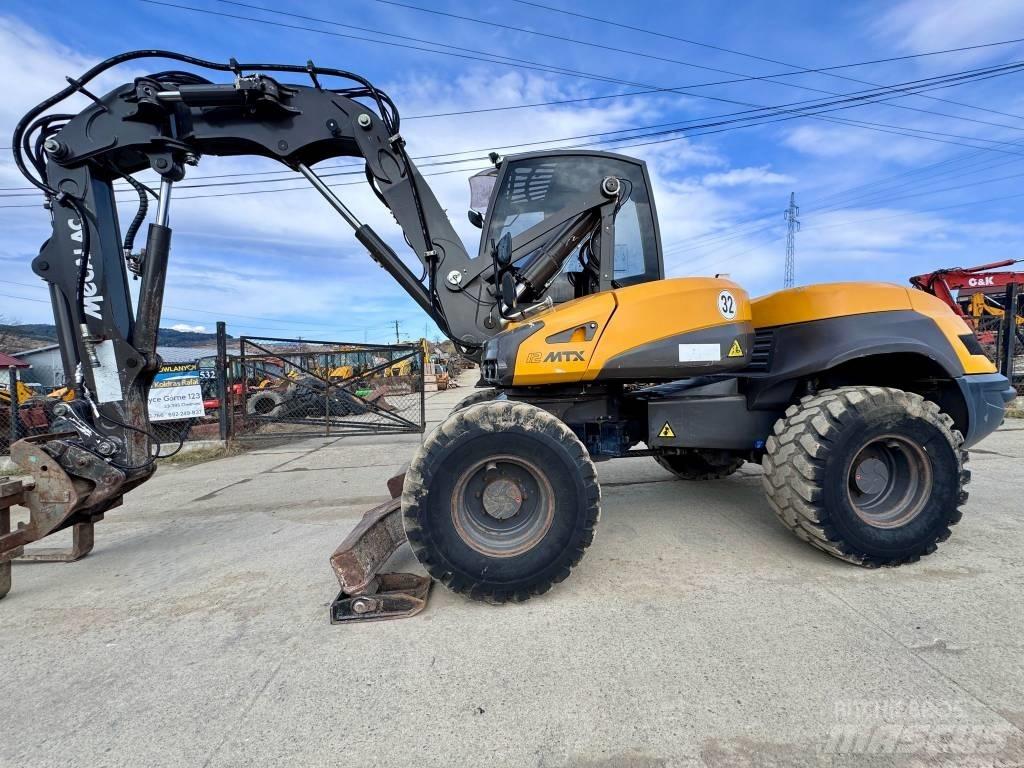 Mecalac 12 M TX バックホーローダー