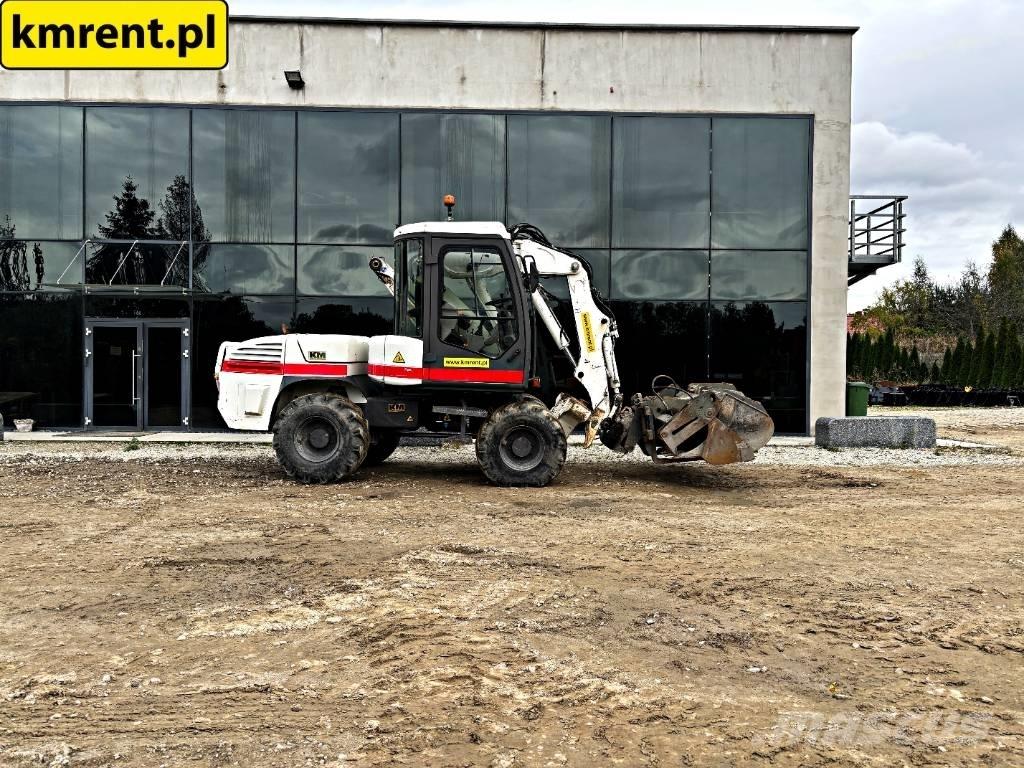 Mecalac 12 M TX バックホーローダー