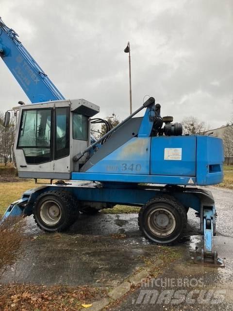 Fuchs 340 廃棄物／工業産廃処理機