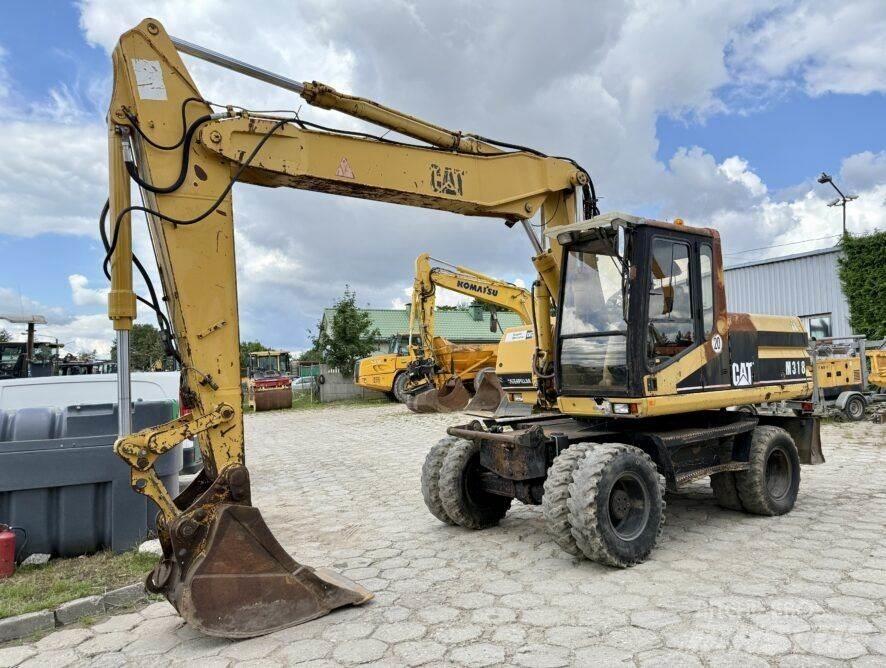 CAT M318 ホイール式油圧ショベル（パワーショベル・ユンボ・バックホー）